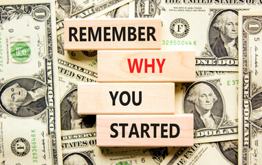 Remember why you started symbol. Concept word Remember why you started on wooden block. Dollar...