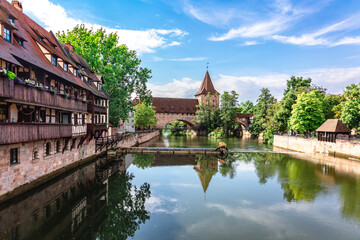 Colourful historic old town with half-timbered houses of Nuremberg. Bridges over Pegnitz river....