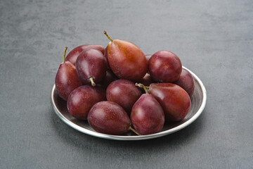 Fresh ripe plums, copy space
