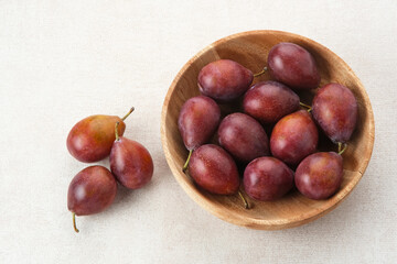 Fresh ripe plums, copy space

