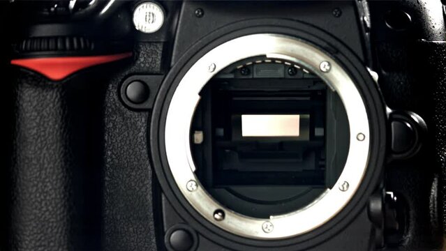 Operation of the release mechanisms of a SLR camera. Filmed on a high-speed camera at 1000 fps. High quality FullHD footage
