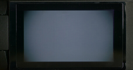 empty and retro looking digicam backside monitor screen with damaged and disturbing video signal,...