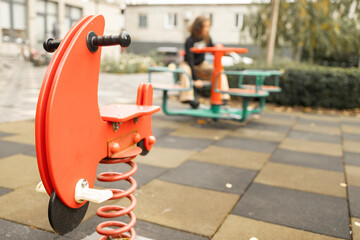 lonely sad Girl on Playground.