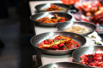 Seafood food in fast food or street food, Cooked octopus tentacle in berry sauce.