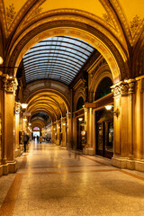 Fototapeta premium Vienne, Austria 10-26-2023 The Palais Ferstel was built between 1856-1860. This ‘temporarily’ accessible passage was designed as a shopping arcade in tradition of the great Parisian shopping passage