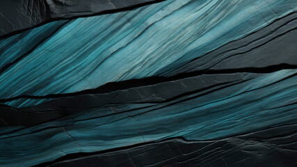 Huge shapes, blocks of reed stone in black and turquoise with rough surface and fissures pattern, as background, texture 
