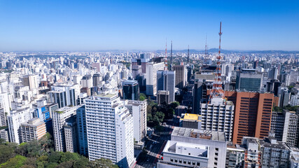 Fototapeta premium Aerial view of Avenida Paulista in Sao Paulo, Brazil. Very famous avenue in the city. High-rise commercial buildings and many residential buildings