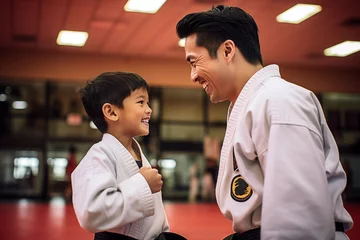 Zelfklevend Fotobehang Taekwondo teacher and student encourage. © siriarpa