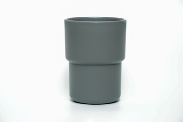 plastic mug gray-black of different colors isolated on white background, clipping path included