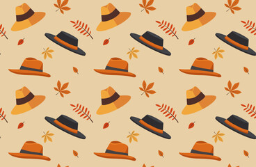 seamless background with autumn hats and leaves