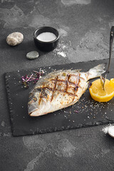 Grilled Fish Served on Modern Slate Plate
