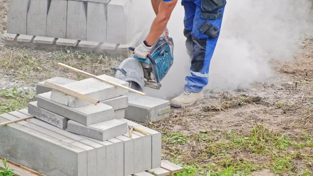 Roadworks Construction Site Conctractor Cutting Concrete Curb Brick with Circular Blade Saw