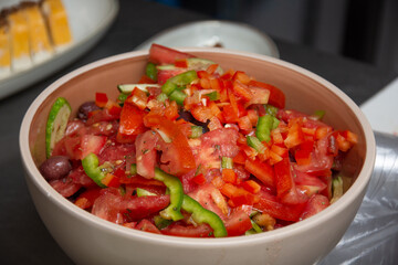 Cucumber salad with tomatoes, cheese,