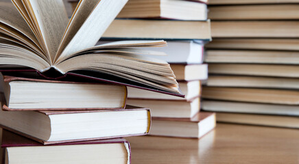 books on wooden deck tabletop