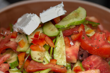 Cucumber salad with tomatoes, cheese,