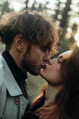 sensual couple in love close-up kissing, curly man and beautiful woman.