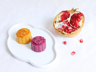 Mid-Autumn Festival food and tea on a white table