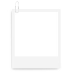 white Polaroid photo frame with a white paper clip on a blank background.