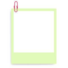 Colored Polaroid photo frame with a colored paper clip on a blank background.