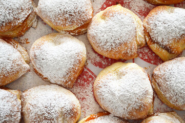 Lard puff pastry wraps with jam, sprinkled with powder sugar
