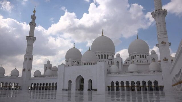 Time lapse view of clouds developing over the Sheikh Zayed Grand Mosque in Abu Dhabi, religion and architecture

