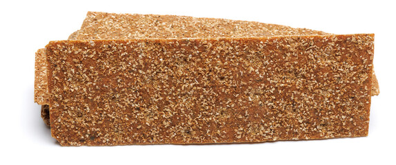 Slices of healthy low calories grain crisp bread for snack and crumbs on white background.