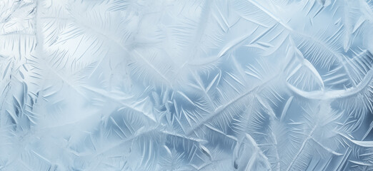 Winter frost patterns on glass. Ice crystals or cold winter background.  frozen ice texture
