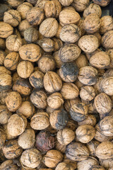 Whole walnuts on the table. View from above - flatlay