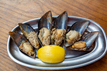 midye dolmasi is stuffed mussels that is a traditional turkish food.  