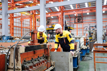 Engineer working in metal roofing factory industrial factory concept.