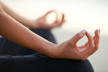 Closeup, yoga and hands in gesture for meditation, zen or calm with cleansing of chakra by outdoor....