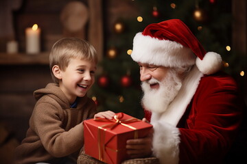 Fototapeta na wymiar santa claus giving gift to child boy