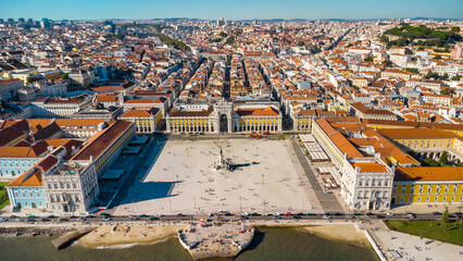 Aerial drone point of view of Commercio Square, Downtown Lisbon, Portugal. Panoramic view of cold city center. Travel destination visited annually by many foreigner tourists. Sunset colours 
