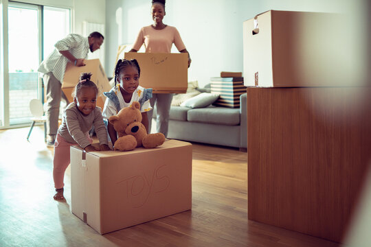 Family unpacks together in their new home
