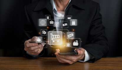 Digital marketing concept, Businessman using smartphone to interface payment online shopping and internet banking,on virtual screen. Data exchanges. Business innovation.