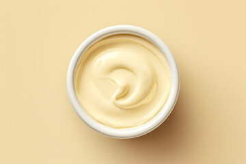 Ceramic dipping cup of cheese sauce, top view. Light yellow background. Minimalism. - obrazy, fototapety, plakaty