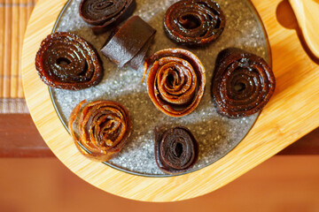 Fruit pastille, sweet fruits, dried fruits and berries. Raw food, vegan sweetness, dessert