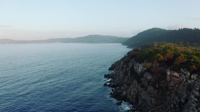 Aerial drone view of Paliouri Beach in Kassandra Sithonia penisula  Chalkidiki Greece Aerial drone view of Paliouri Beach Chrousso Village in Kassandra Sithonia penisula  Chalkidiki Greece