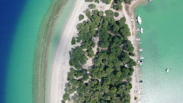 Aerial drone view of Port Glarokavos and lagoon beach in Kassandra penisula Chalkidiki Greece. Lagoon drone view blue sea Greece.