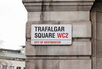 Trafalgar Square street sign on a wall in Westminster, London, UK.  - obrazy, fototapety, plakaty