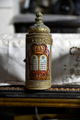 sefer torah Torah scrolls A silver antique with a tour of the tablets of the covenant with the...