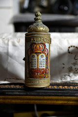sefer torah Torah scrolls A silver antique with a tour of the tablets of the covenant with the Hebrew letters