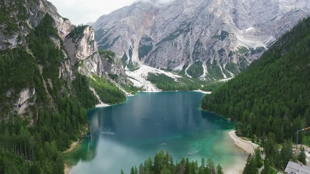 drone video Braies lake, Pragser Wildsee Lago di Braies dolomites italy europe	