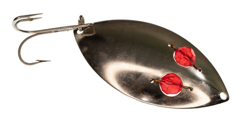 Macro image of a silver-colored fishing lure with red “eyes” and a treble hook. On a clean background.
