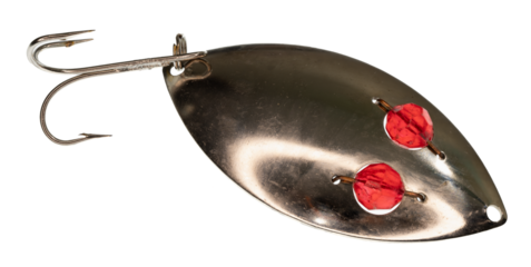 Macro image of a silver-colored fishing lure with red “eyes” and a treble hook. On a clean background.
