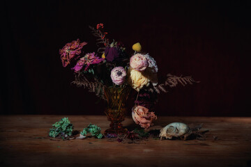 still life with flowers and skull