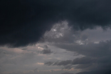 Dramatic stormy cloudscape. Extrem weather background.