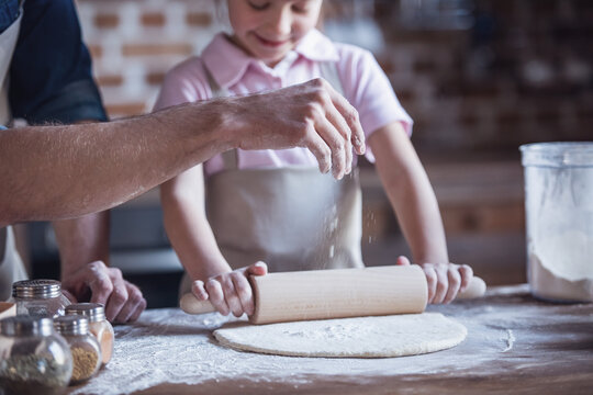Dad and daughter cooking