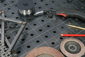 there are tools for work on the welding table