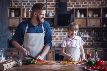 Dad and daughter cooking